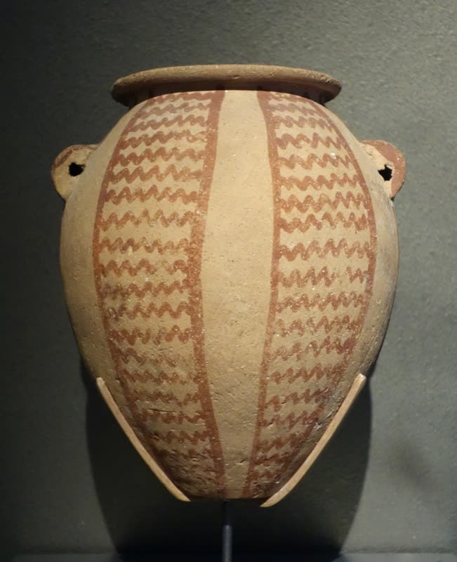 Painted Egyptian jar with zigzag panels